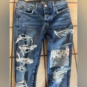 Distressed Blue Jeans with Patchwork Amiri